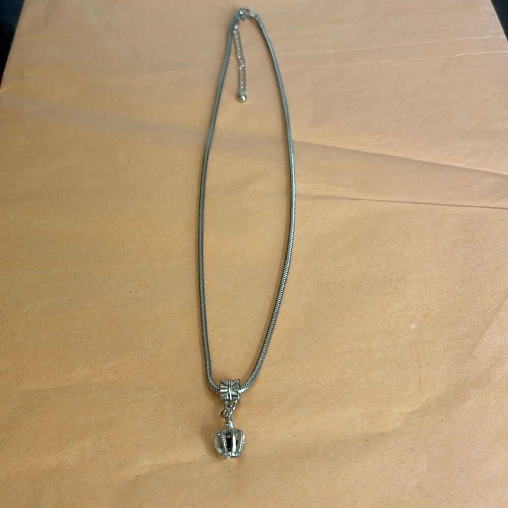 Silver tone‎ necklace with crown pendant and lobster claw clasp